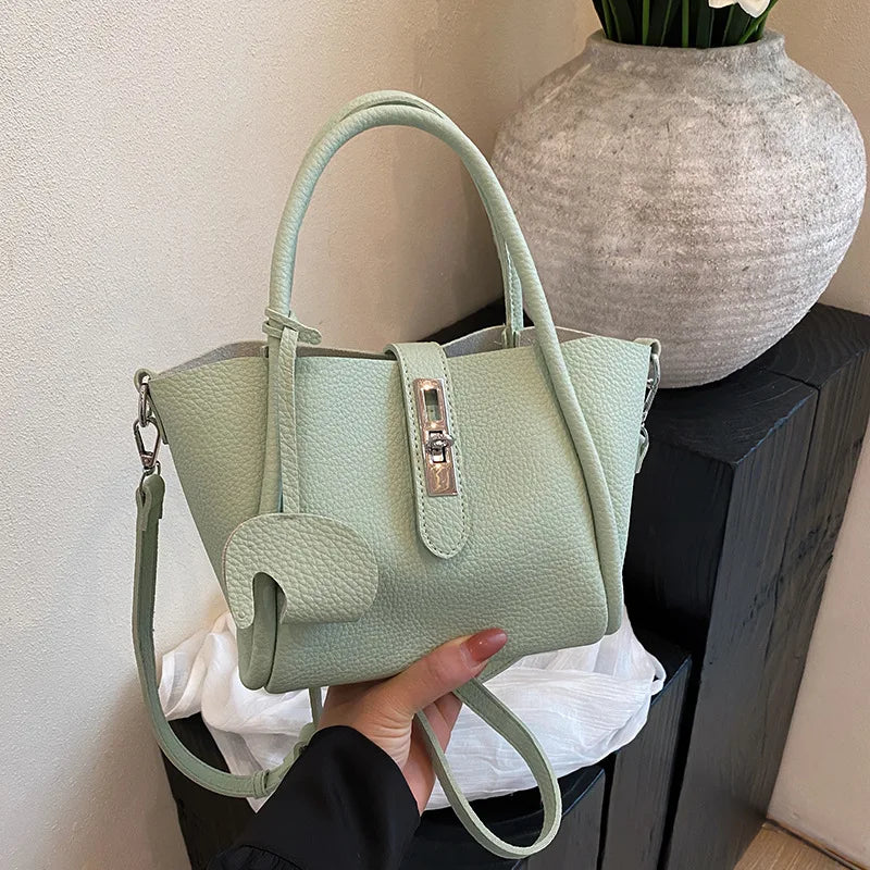 Women Handheld Bucket Bag New Trendy Versatile Bag Highend Exquisite Hardware Buckle Shoulder Bag With Pendant Crossbody Bag