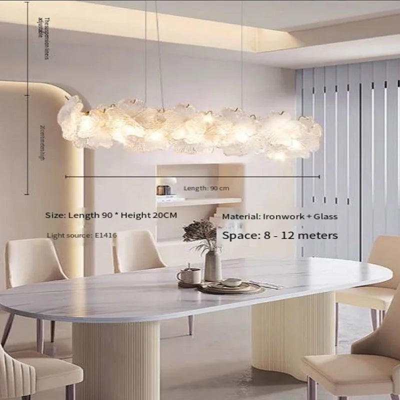 French-style minimalist restaurant - modern and simple long dining table with crystal chandelier