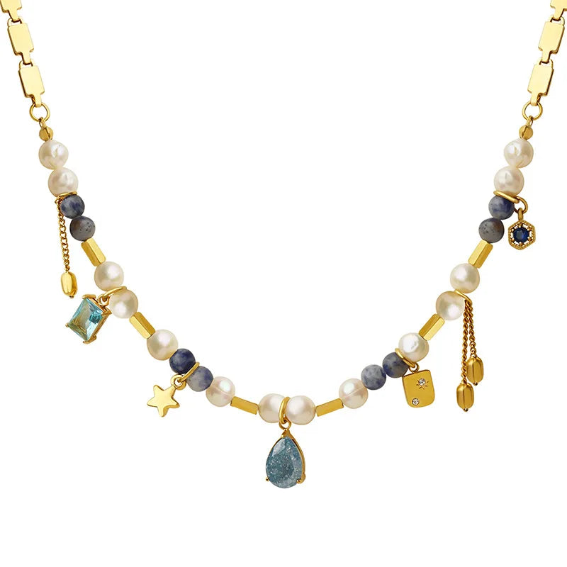 JINDOOR Elegant Golden Necklace with Freshwater Pearls, Blue Stones & Celestial Charms – Interwoven Jewelry for Women