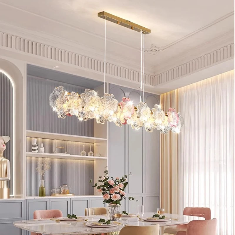 French-style minimalist restaurant - modern and simple long dining table with crystal chandelier