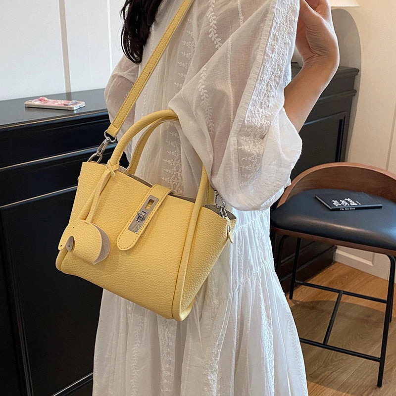 Women Handheld Bucket Bag New Trendy Versatile Bag Highend Exquisite Hardware Buckle Shoulder Bag With Pendant Crossbody Bag