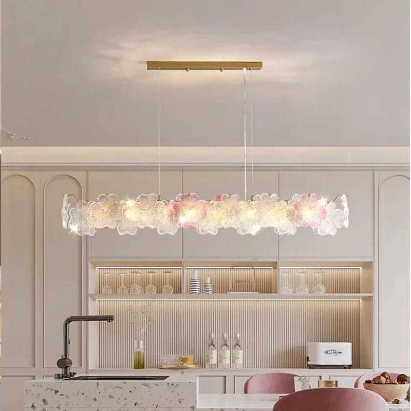 French-style minimalist restaurant - modern and simple long dining table with crystal chandelier