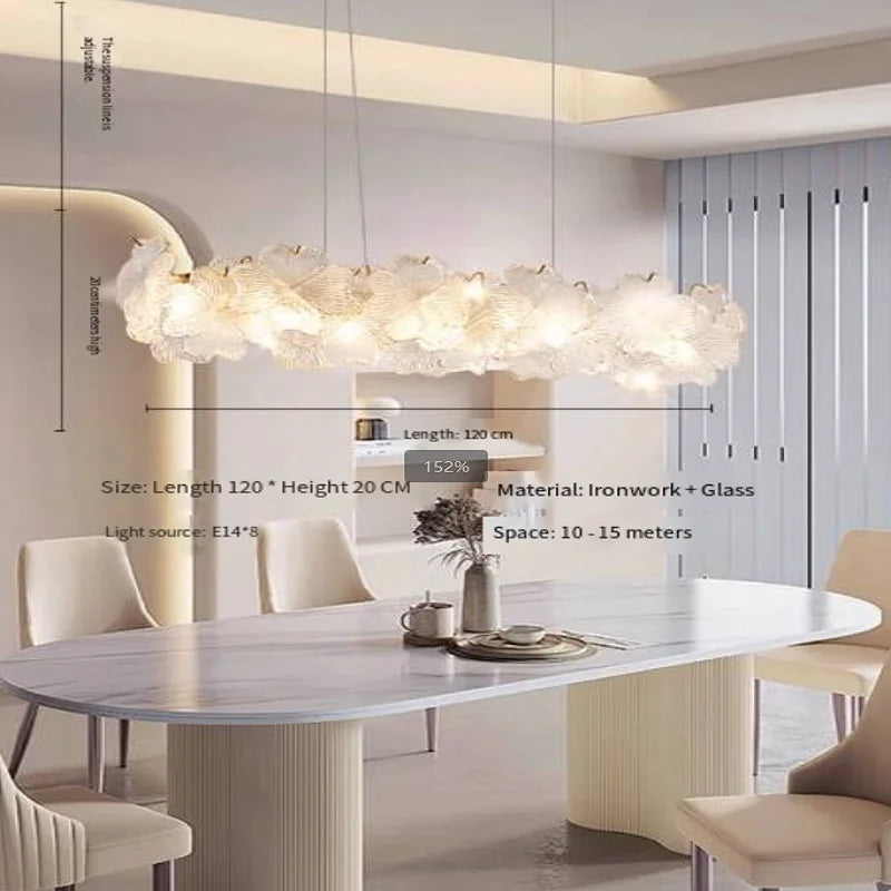 French-style minimalist restaurant - modern and simple long dining table with crystal chandelier
