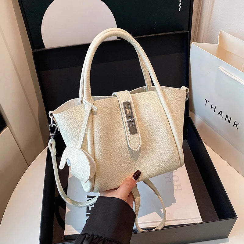 Women Handheld Bucket Bag New Trendy Versatile Bag Highend Exquisite Hardware Buckle Shoulder Bag With Pendant Crossbody Bag