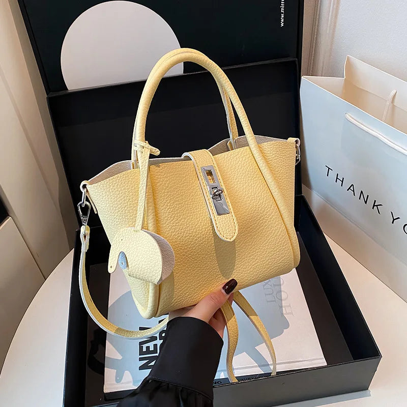 Women Handheld Bucket Bag New Trendy Versatile Bag Highend Exquisite Hardware Buckle Shoulder Bag With Pendant Crossbody Bag